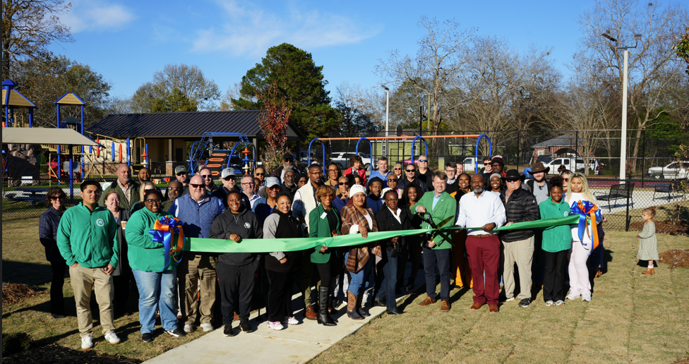 Group standing with ribbon